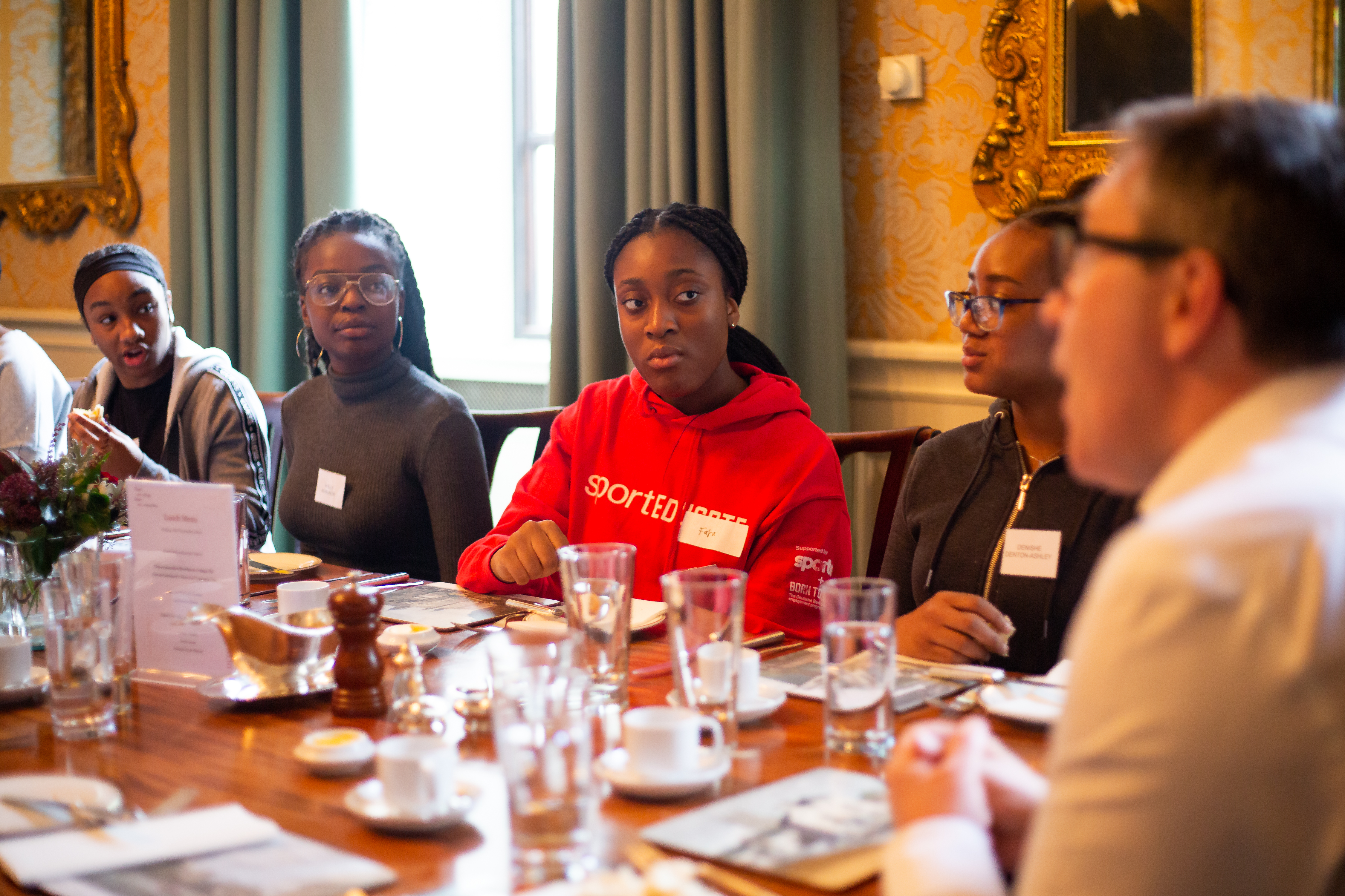 Generating Genius participants at dinner